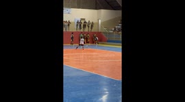 Headshot! Spectator knocked to ground by futsal player's wayward shot