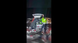 Snow-trapped vehicle rescued by police officers in north China