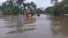 Thousands evacuated as shear line brings widespread flooding to Philippine island
