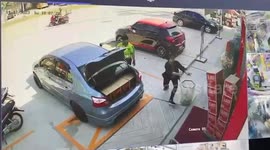 Shop worker saves boxes of beer bottles from toppling over