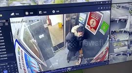 Terrifying moment woman and dog flung into air after lead gets trapped in lift door