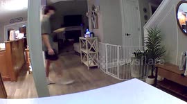 Security Camera Captures Fall Over Pet Gate