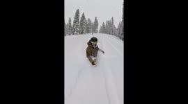 Snowboarder glides straight through 2 feet of powder in Utah