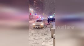 Heavy snow blankets Central Park in New York