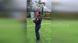 LA fire brigade spokesman throws football pass to mark Super Bowl