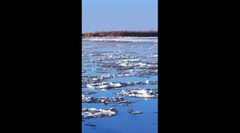 Floating ice glitters on Yellow River in NW China