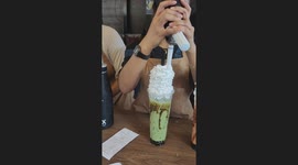 Shop serves milk tea with seriously stacked whipped cream