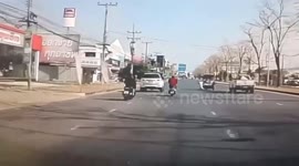 Toddler rolls into motorway before being saved by hero onlookers