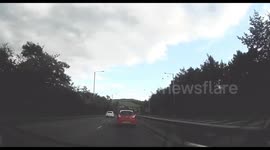 A Boy standing in middle of a dual carriageway in Cardiff nearly gets wiped out. Shocking Nearmiss caught on Dashcam