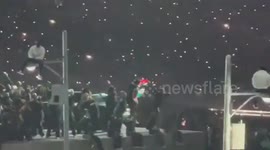 US: An activist waved Palestinian and Sudanese flags during halftime of the Super Bowl before security escorted him off stage