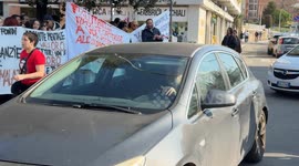 Demonstrators protest under the Lazio Region building during the demonstration organized by the associations of the regional mental health network in front of the headquarters of the Lazio Region in Rome.