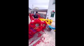 Salute from a 3-year-old lion dancer