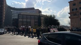 Demonstrators protest under the Lazio Region building during the demonstration organized by the associations of the regional mental health network in front of the headquarters of the Lazio Region in Rome.