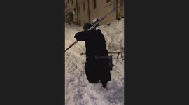 Skiiing On Snowy Town Streets
