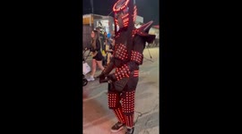 Man Dances in Light-Up Robot Costume