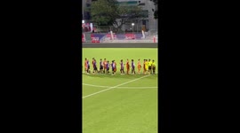 Footballer runs onto pitch and floors opponent with an elbow