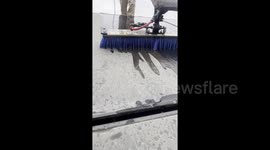 Satisfying footage of dusty solar panels being cleaned