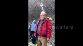 Hilarious moment bald man's head steams in freezing weather during mountain climb