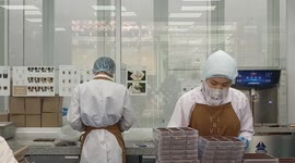 Workers finish making chocolate at Terve Artisan Chocolate Factory, Bandung, West Java, Indonesia February 13, 2025. Ahead of Valentine's Day 2025 Terve Chocolate Factory makes Valentine-themed chocolates.