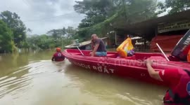 Philippine Red Cross volunteers rescue residents from floods