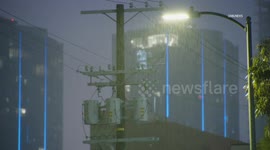 US, Los Angeles: Downtown Los Angeles Light Rain Begins to Fall as Storm Edges Closer