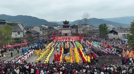 Painted-face dragon dance performed in China's Guizhou