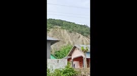 Landslide crashes down hillside burying homes in Indonesia