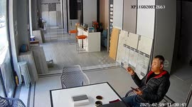Van crashes through glass and interrupts worker's cigarette break