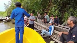 Grandmother, 64, killed by crocodile while fishing in river in Indonesia