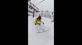 Hilarious moment snow lift hits skiers on slope in Japan