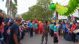 RESIDENTS CROWD THE CAP GOMEH CULTURAL PARADE IN BANDUNG
