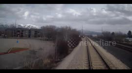 US: Dramatic Moment as Train Strikes SUV After Driver Escapes Collision in Layton, Utah