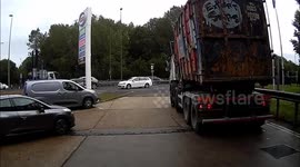 Truck Crashes Into Car At Gas Station