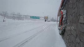 Heavy snow blankets roads in upstate New York