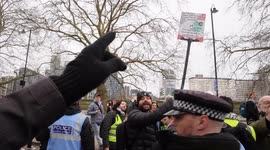 Man arrested in London after holding a sign praising Hamas & Hezbollah during a pro-Palestine protest.Both groups are banned terrorist organizations in the UK. Police intervened swiftly.