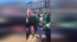 US: Eagles Parade Surprises Fans as Saquon Barkley Brings Ball Boy Into the Celebration