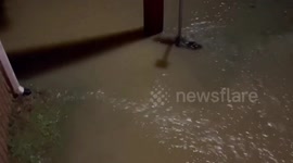 Floodwaters Rise Again in Gray, Kentucky as rising waters overflow walkaways and roads