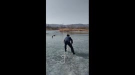 Local citizens rescue man from icy water in N China
