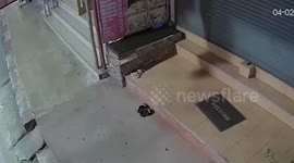 Sole suspect! Tourist seen on CCTV 'stealing shoes from outside massage' shop