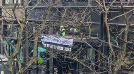 'Cut the Ties' environmental activists spray and occupy McKinsey & Company in London