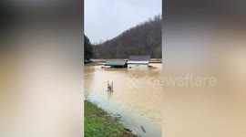 At least 10 people dead as parts of the US are hit by severe flooding