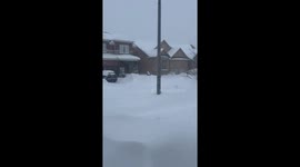 Locals measure snow in Ontario amid power outage fears