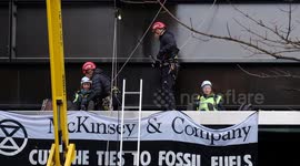 Watch Extinction Rebellion activists occupy building canopy in fossil fuel protest in London