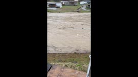 Rising floodwater threatens nearby homes in Kentucky