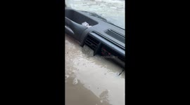 Land Rover Gets Stuck in River