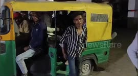 Shocked police find 19 passengers crammed into a rickshaw in India