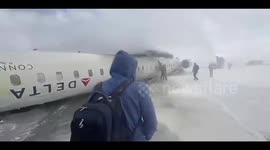 Delta Airlines plane overturned after crash at Toronto airport