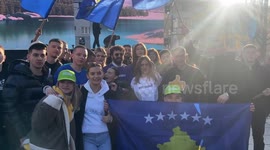 Leaders and supporters of the Partia Demokratike e Kosoves political party attend the last public speech in the city centre of Pristina