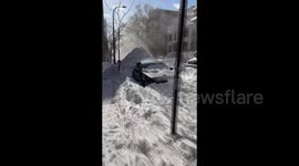 Record-breaking snow covers roads and vehicles in Montreal
