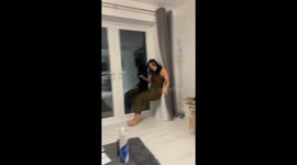 Drunk sister falls backward while trying to open door, causing fits of laughter